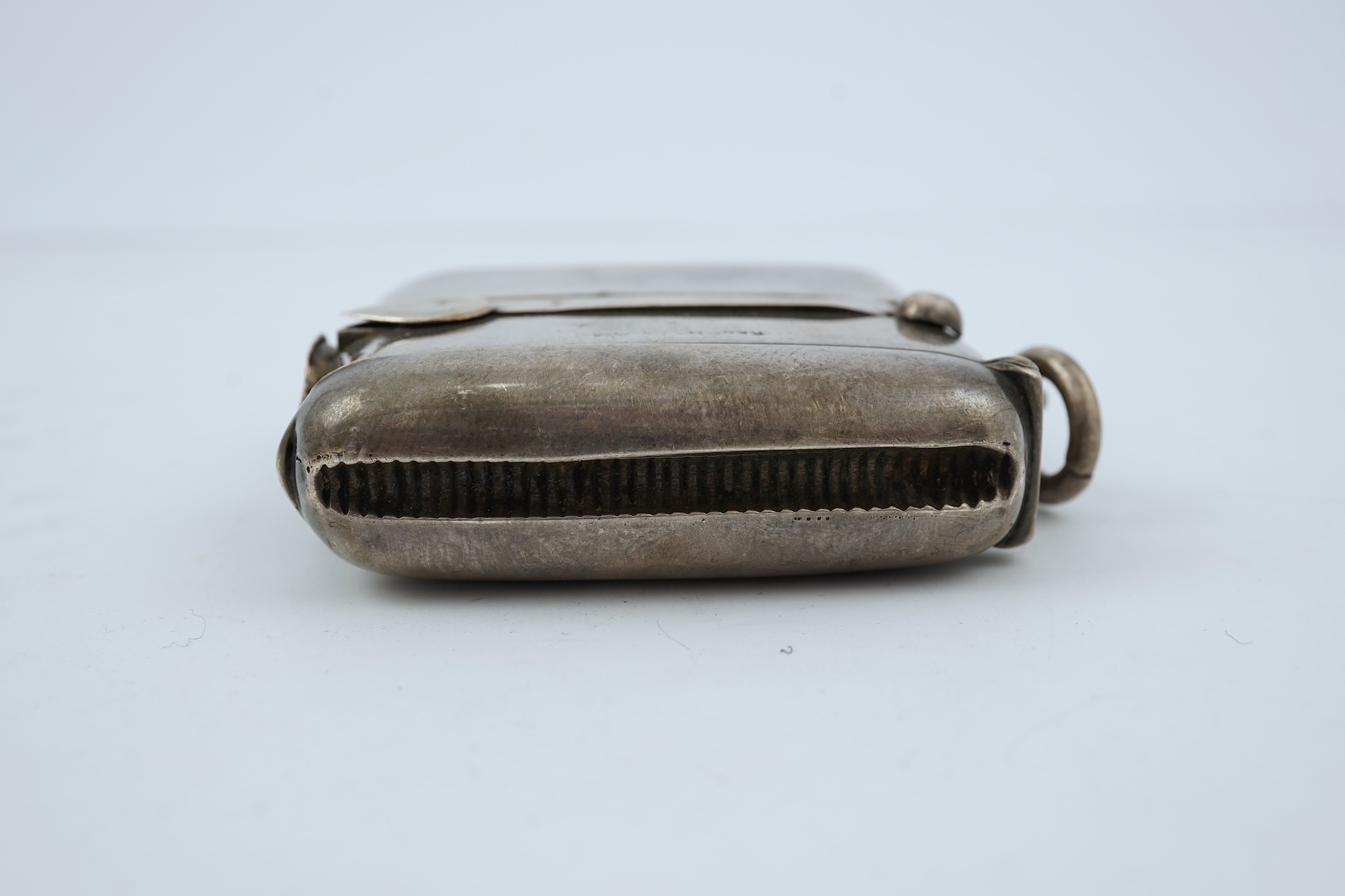 A late Victorian silver combination, cigar cutter, sovereign/half sovereign and vesta case by William Hair Haseler